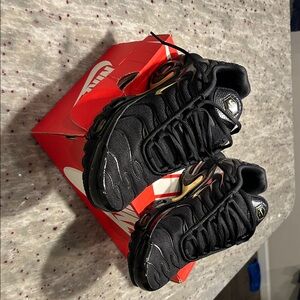 Nike Black and Metallic Sneakers